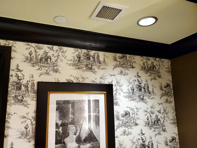Safari toile powder room: With black crown moulding