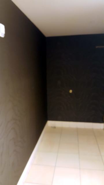 Charcoal swirl powder room: Moody and precise