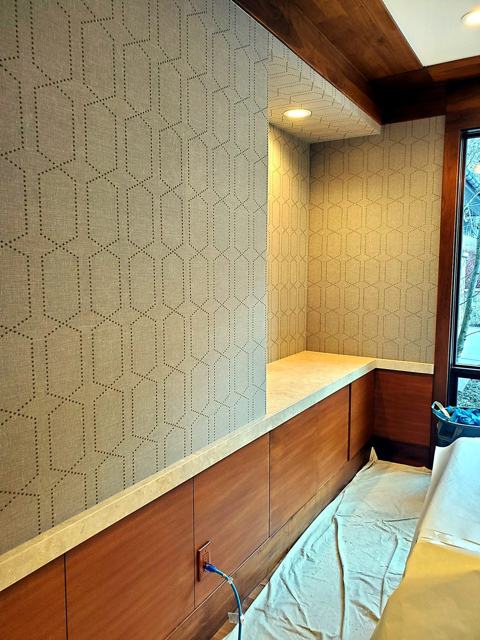 Paneled dining room: Geometric paper over the wainscot