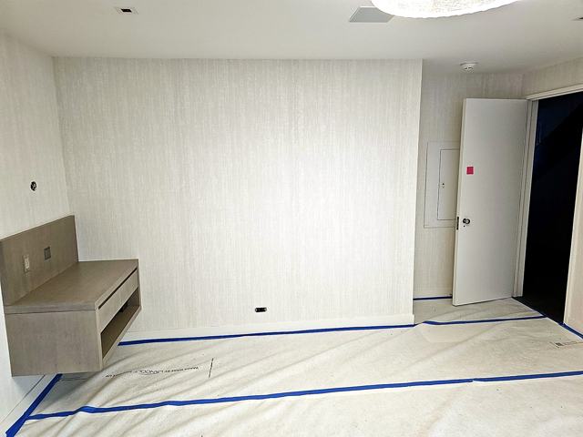 Travertine-look corridors — hotel: Office nook, same paper