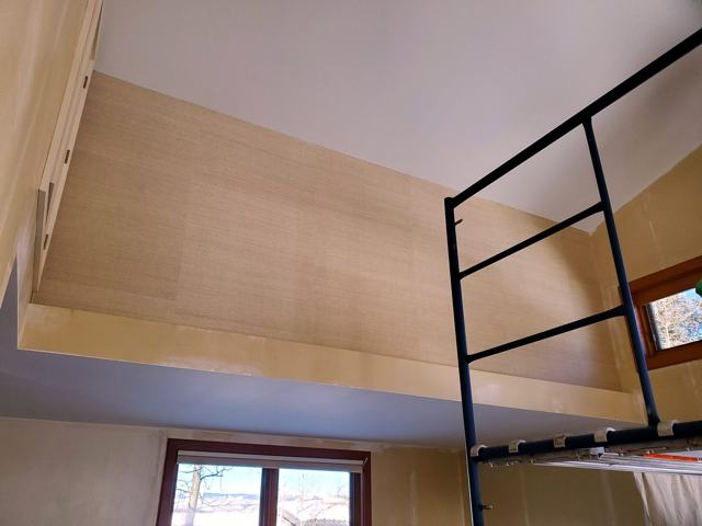 Tartan plaid feature walls: Grasscloth loft detail