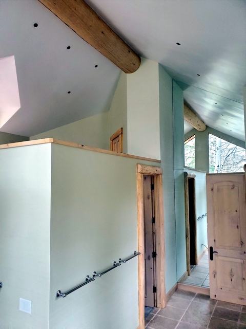 Sage master bath: Under the log beams
