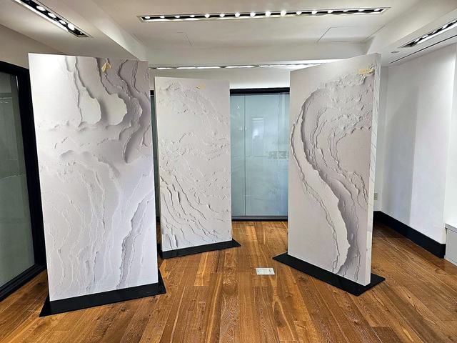 Sculpted relief panels — hotel: Panels staged in the showroom