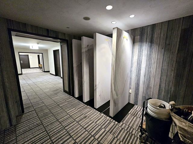 Sculpted relief panels — hotel: Corridor installation