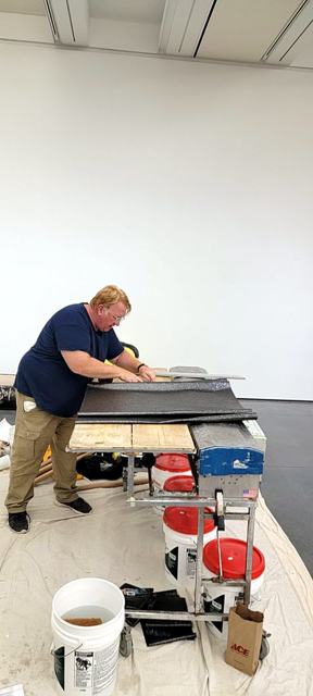 Charcoal shimmer feature wall: Cutting sheets to length