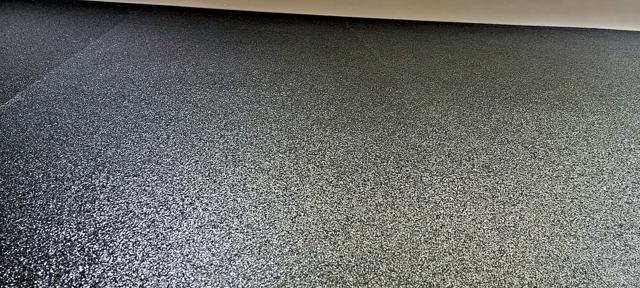 Charcoal shimmer feature wall: Texture detail