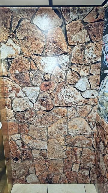Photographic stone print: Printed from a photo of the building's own stone
